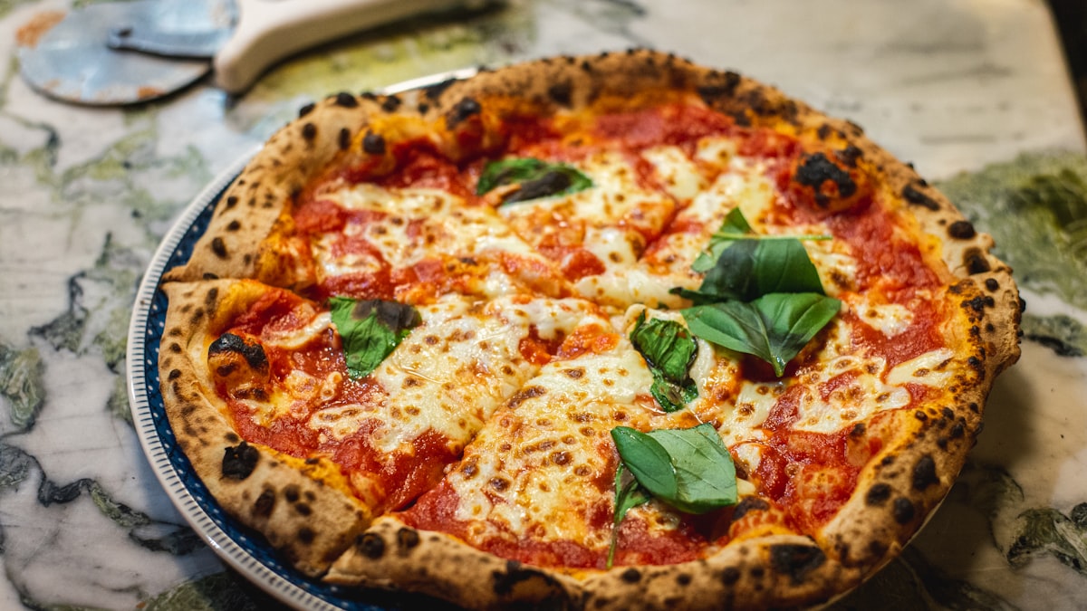 A mussarela é 60% do custo da sua pizza — e é por isso que ela anda mais fina